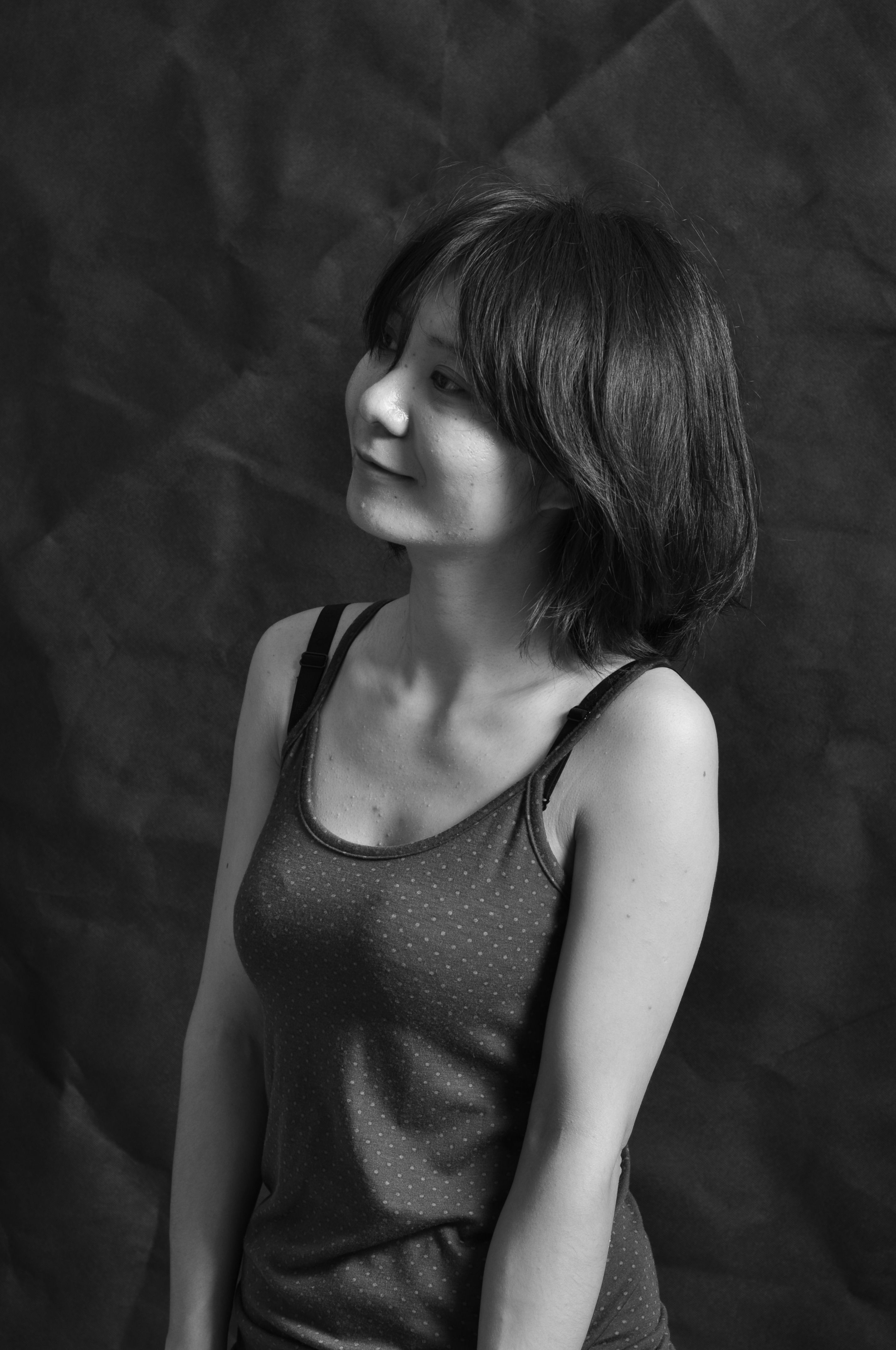 Black and White Portrait of a Smiling Young Woman · Free Stock Photo