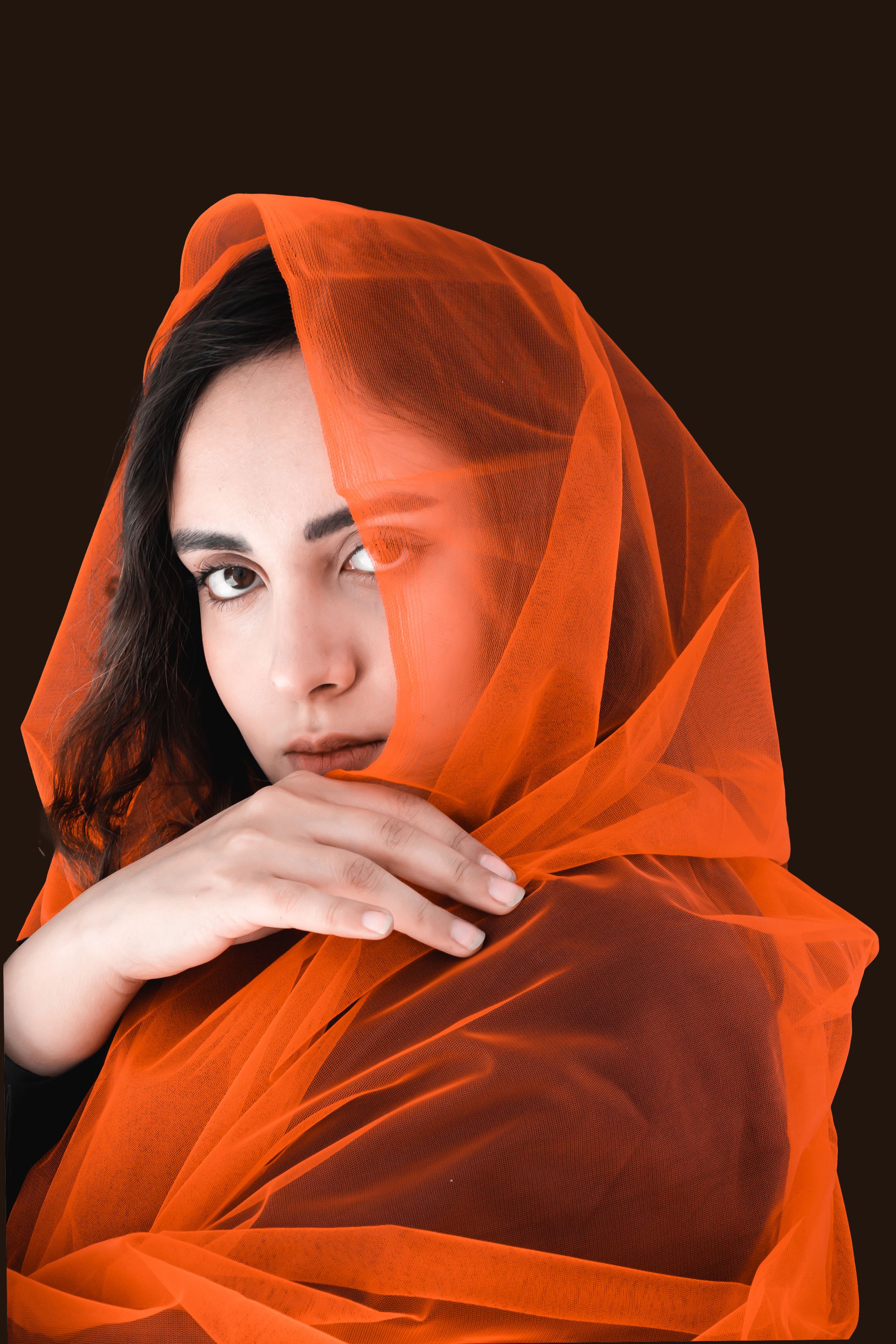 Elegant Portrait of Woman in Orange Veil · Free Stock Photo