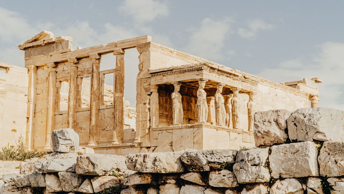 The iconic Erechtheion temple with Caryatids at the Acropolis in Athens, Greece.