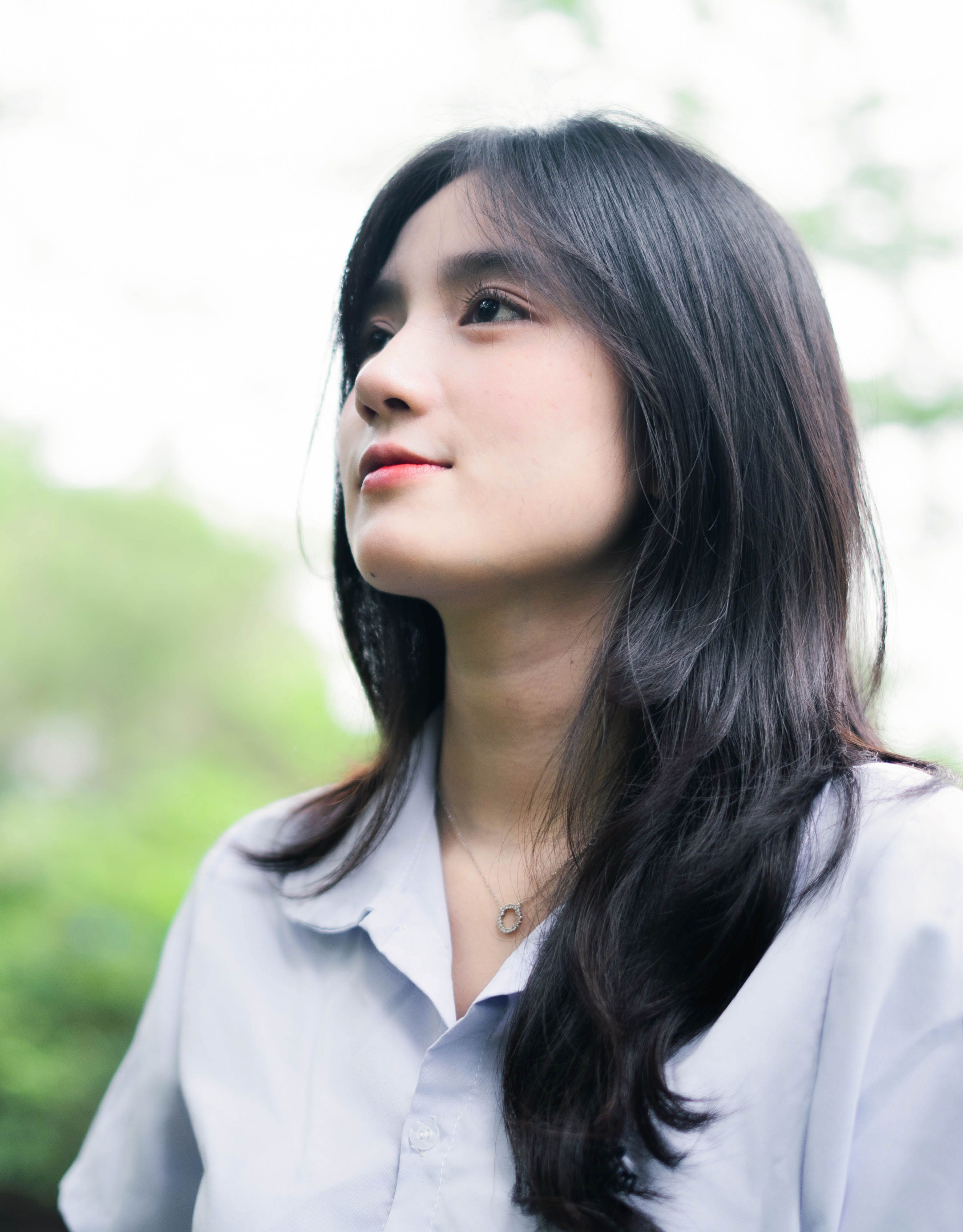 Portrait of a Young Woman Outdoors in Spring