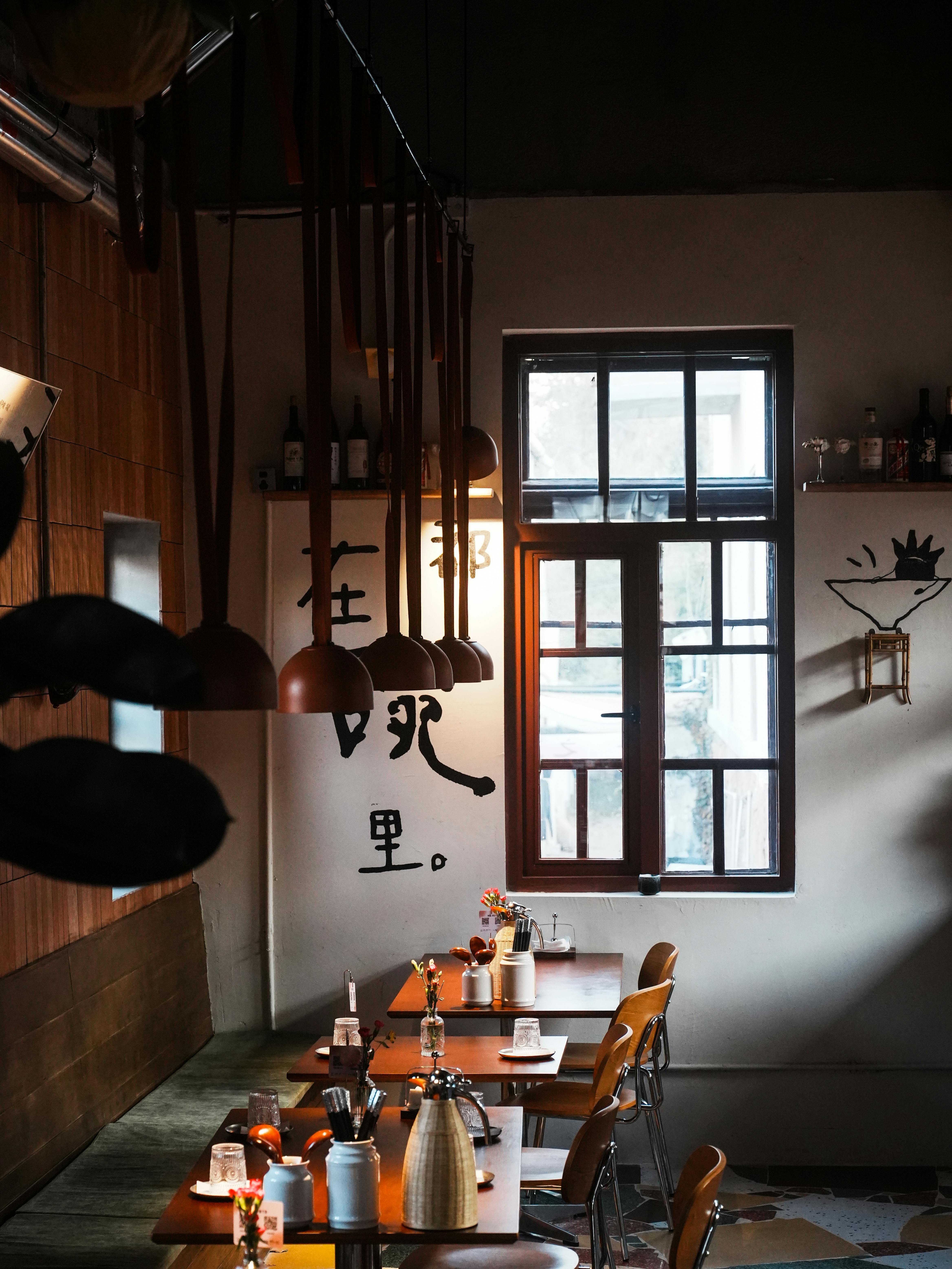 Warm and inviting restaurant interior with modern decor, perfect for dining.