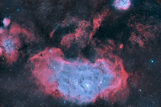 Breathtaking view of a vibrant nebula, showcasing cosmic colors and stars in deep space.
