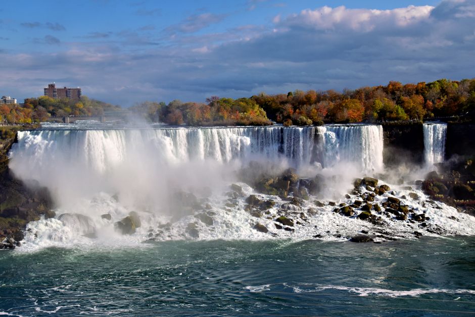 Spectacular Helicopter Flight 12/13 Minute (Zimbabwe) Review: Soaring Over Victoria Falls Like an Angel Review 2026 - Captivating autumn scene of Niagara Falls with vibrant foliage and cascading waters.