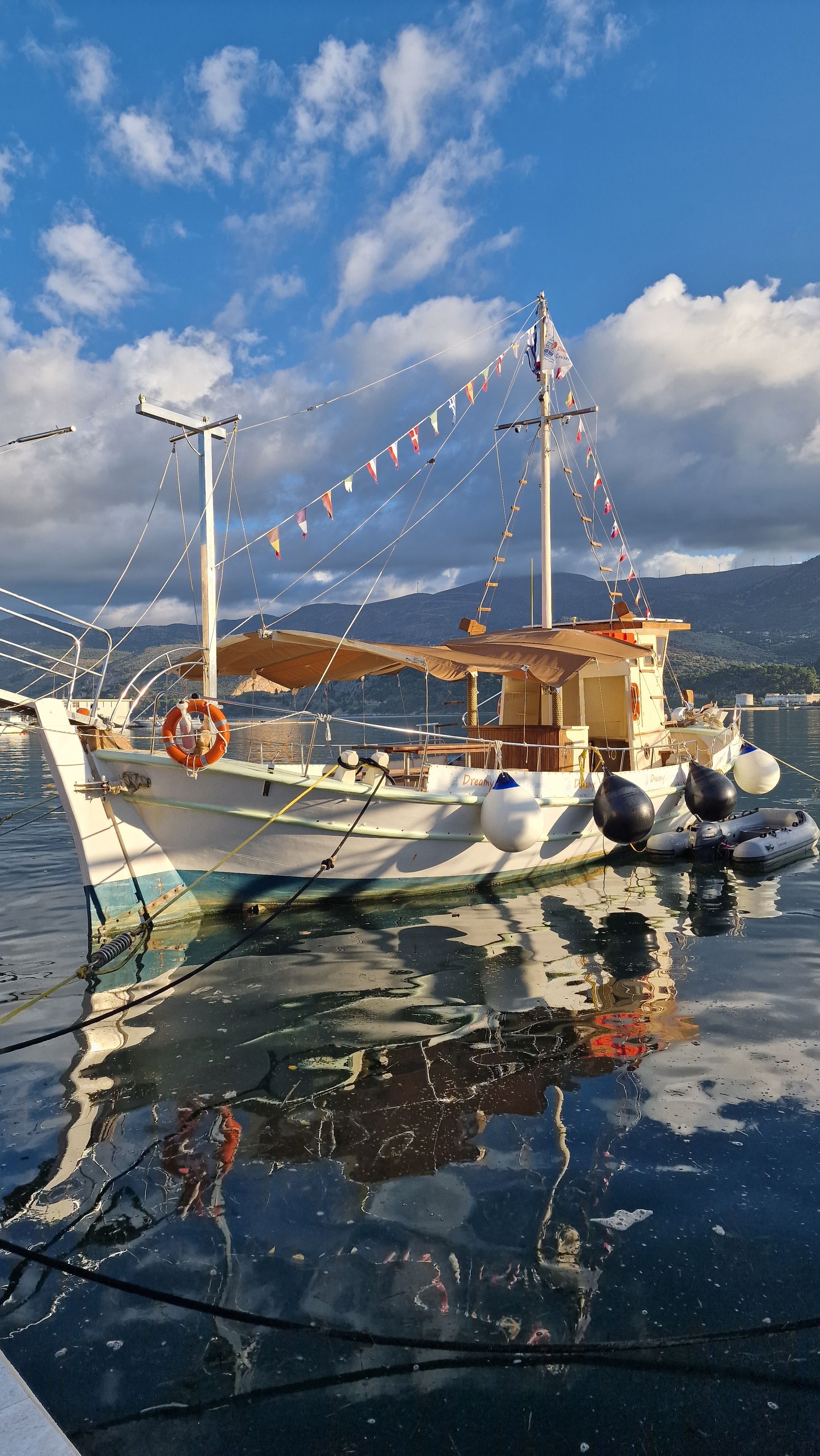Traditional Wooden Boat Docked in Harbor · Free Stock Photo