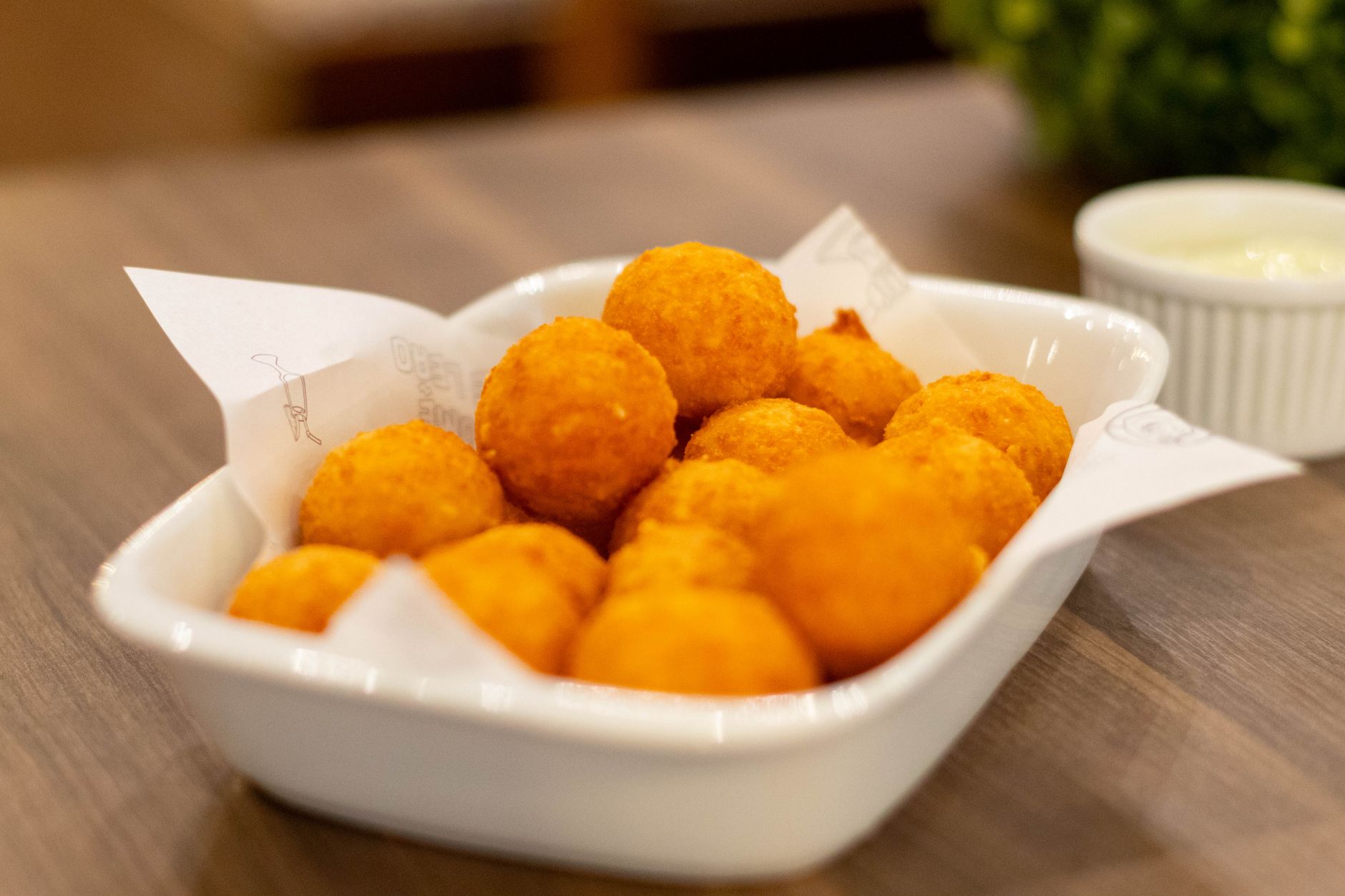 Golden fried mac and cheese balls with dipping sauce