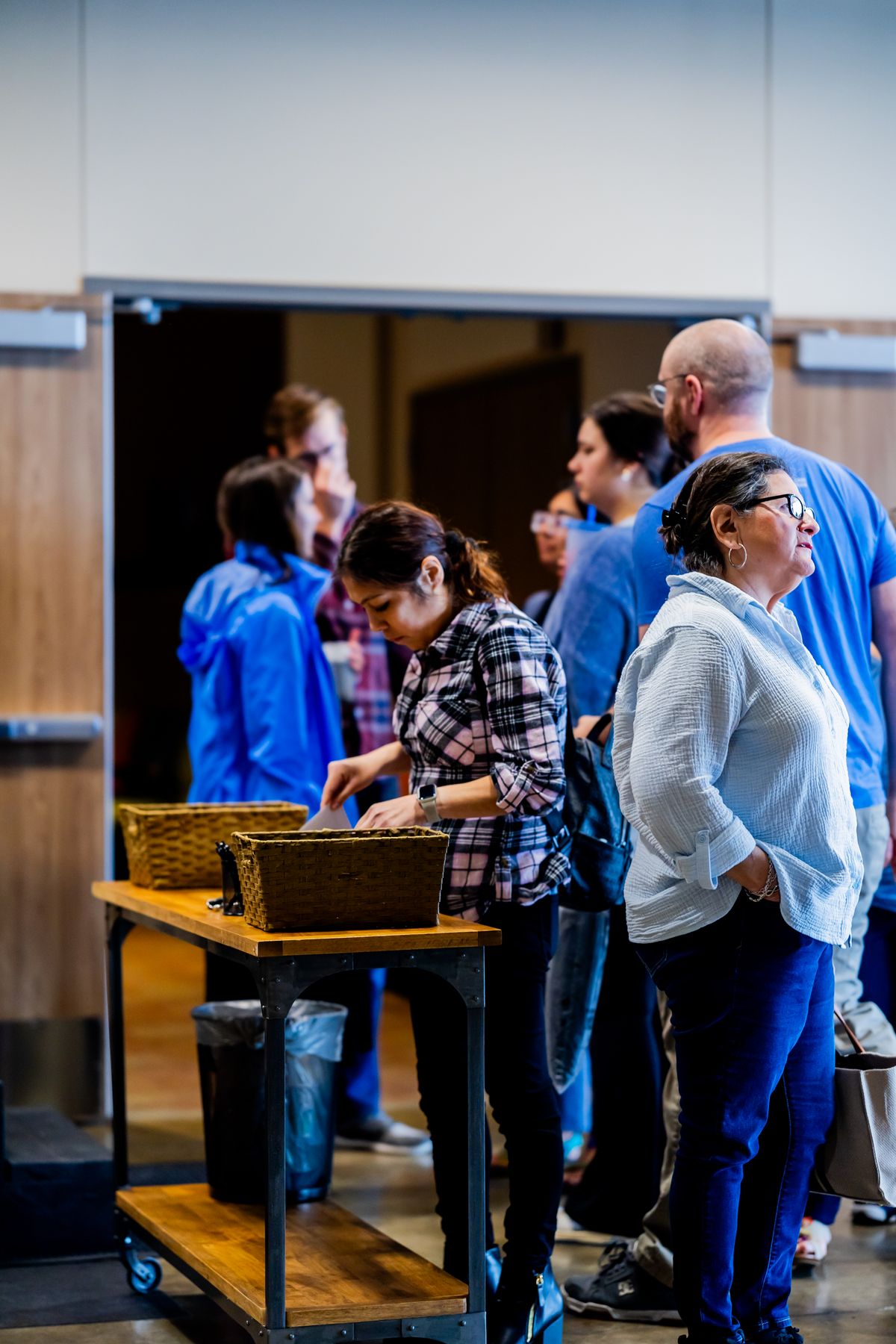 Adults gathering and connecting at a community event