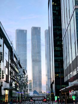 View of modern skyscrapers in Moscow's city center during dawn, highlighting urban architecture.