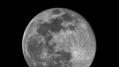 Free Captivating black and white photo of a full moon in the night sky over São Pedro de Alcântara. Stock Photo