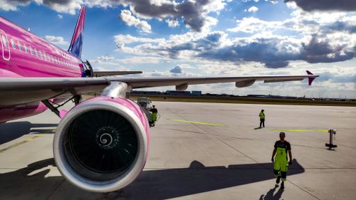 Free stock photo of aircraft, airfield, clouds Stock Photo