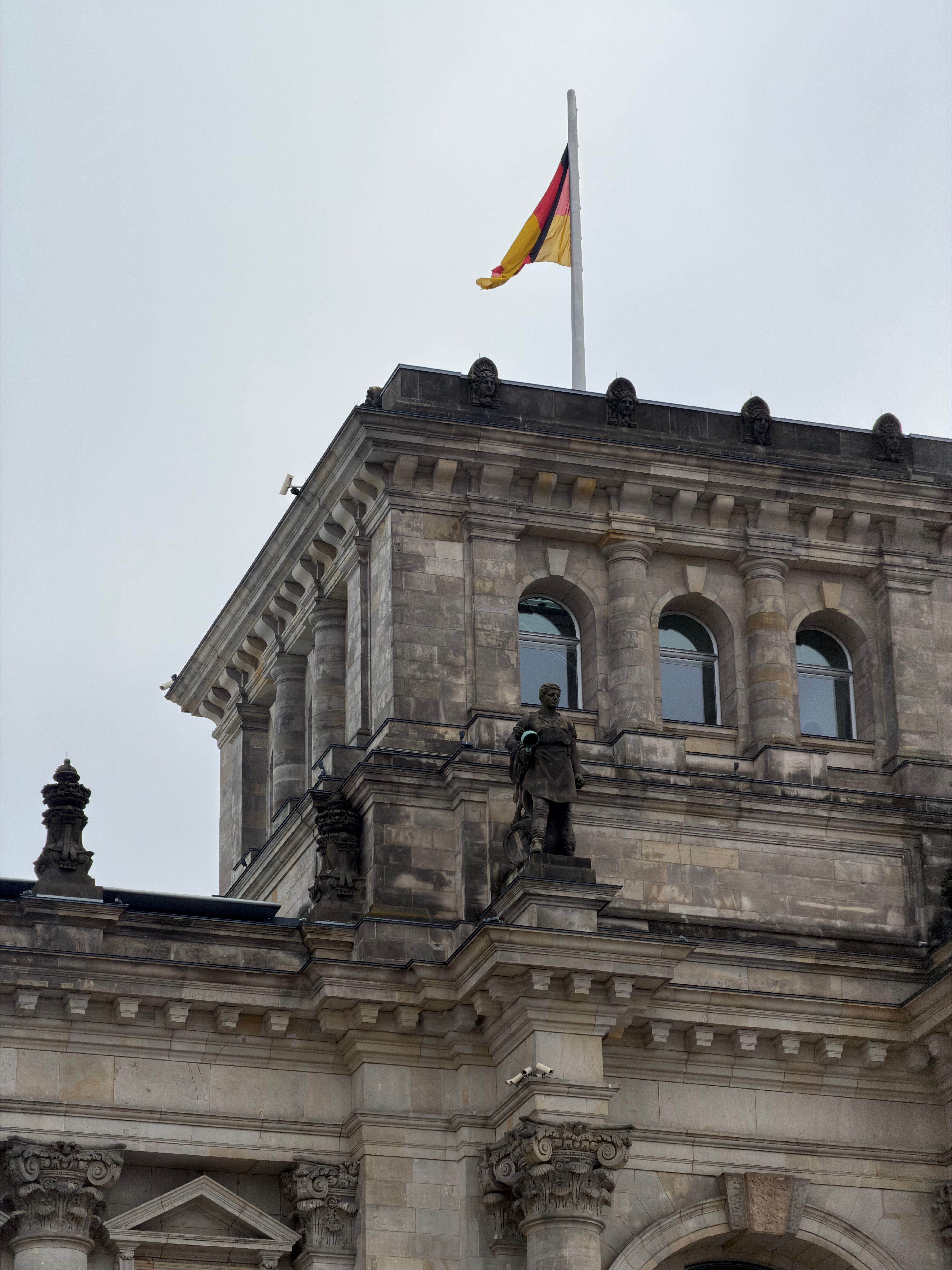 Reichstag Building with German Flag in Berlin · Free Stock Photo