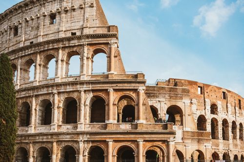 Free A stunning daytime shot of the famous Colosseum in Rome, showcasing its ancient architectural grandeur. Stock Photo