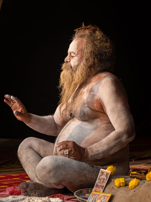 Free A Naga Sadhu meditates during a spiritual gathering in Varanasi, India. Stock Photo