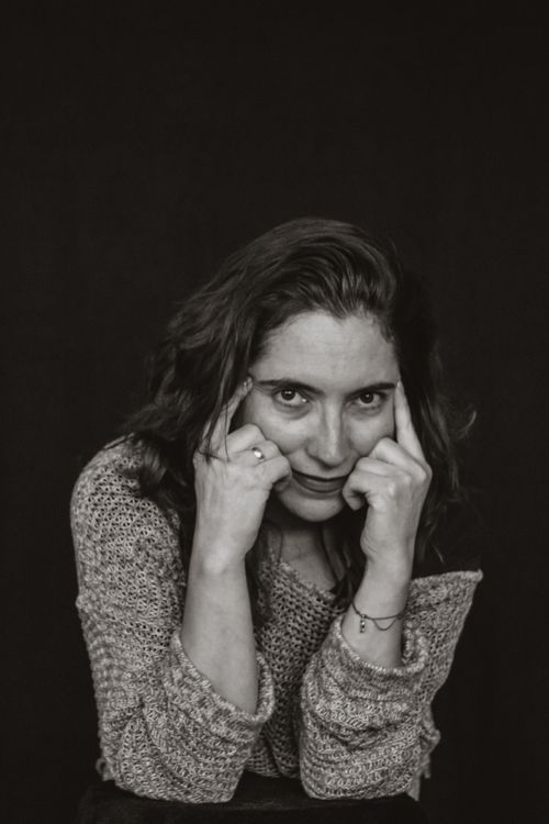Free Emotive black and white portrait capturing a woman's thoughtful expression. Stock Photo