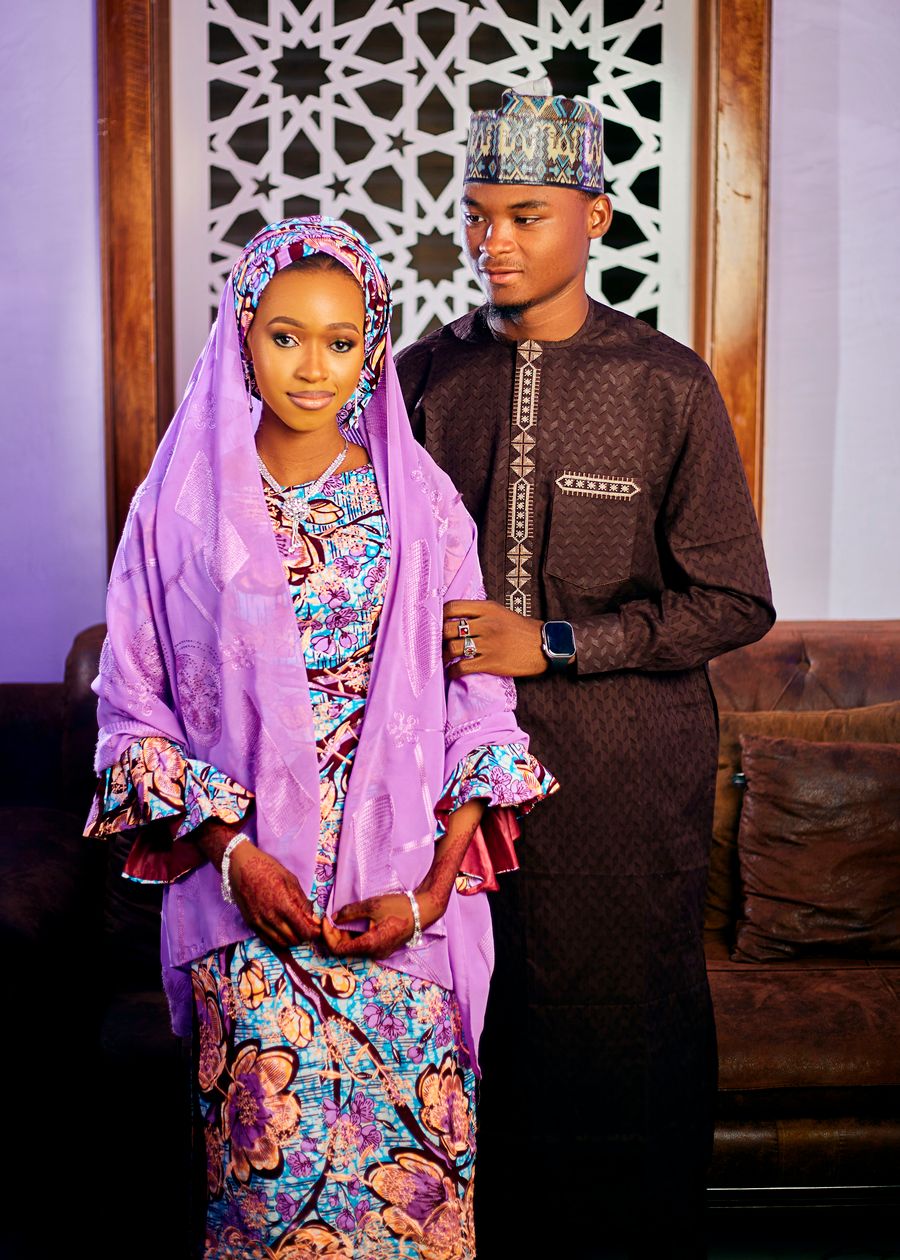 African couple in traditional dress at an engagement ceremony