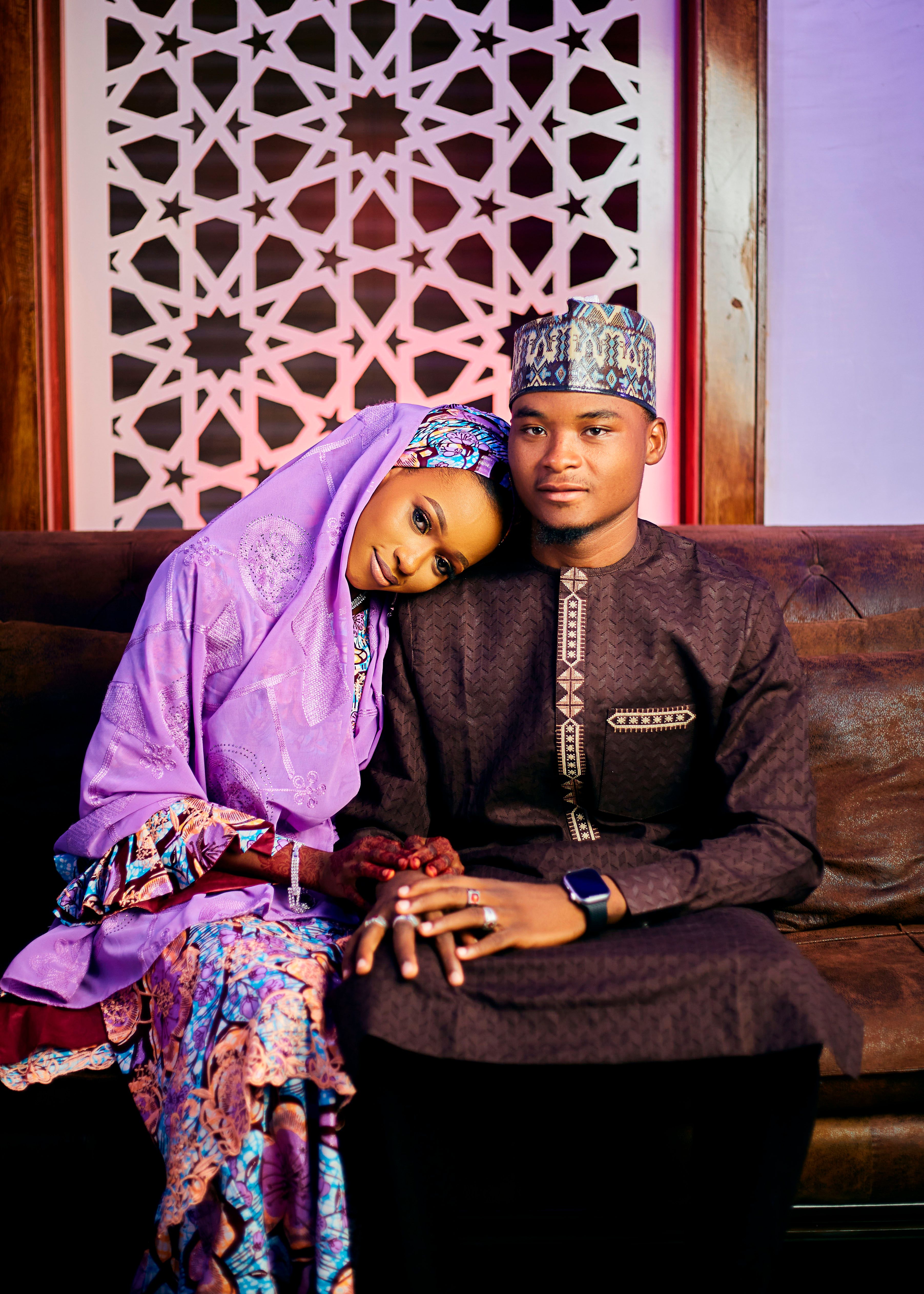 Elegant Traditional Attire Couple Portrait · Free Stock Photo