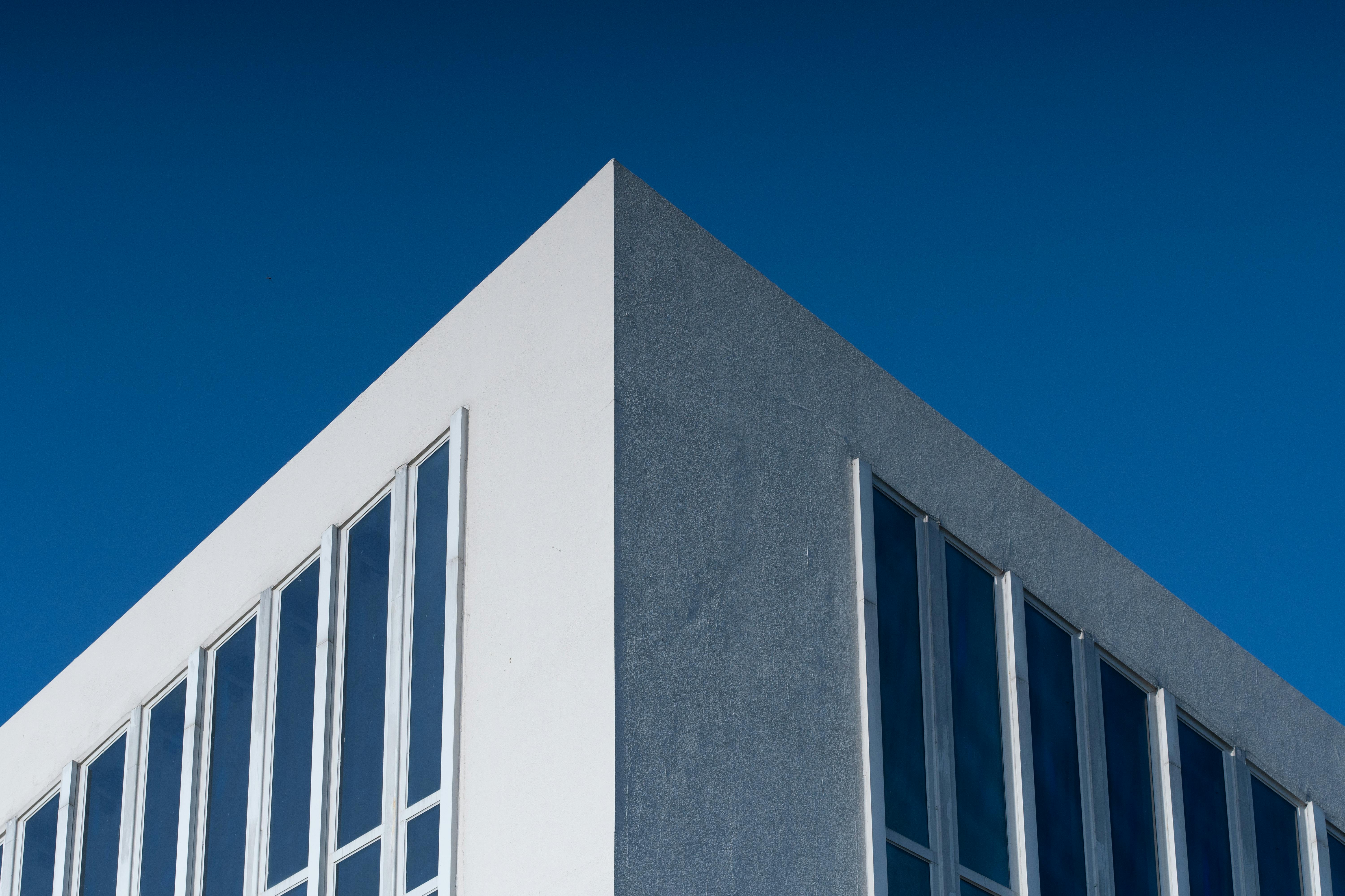 Modern Minimalist Building Against Clear Blue Sky · Free Stock Photo, image size:6000x4000