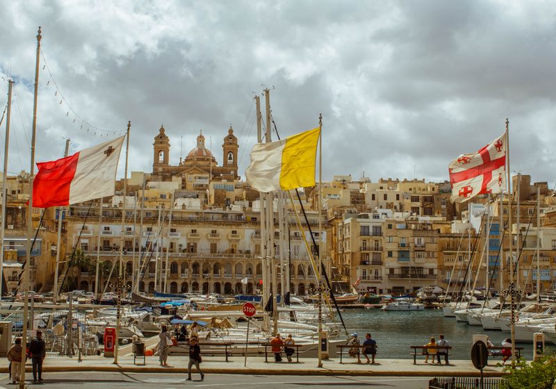 Scenic view of Malta harbor with boats and historic architecture