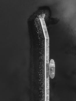 A striking aerial view of a pier in Jönköping, Sweden captured in black and white.