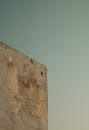 Aged Weathered Wall Under Clear Sky