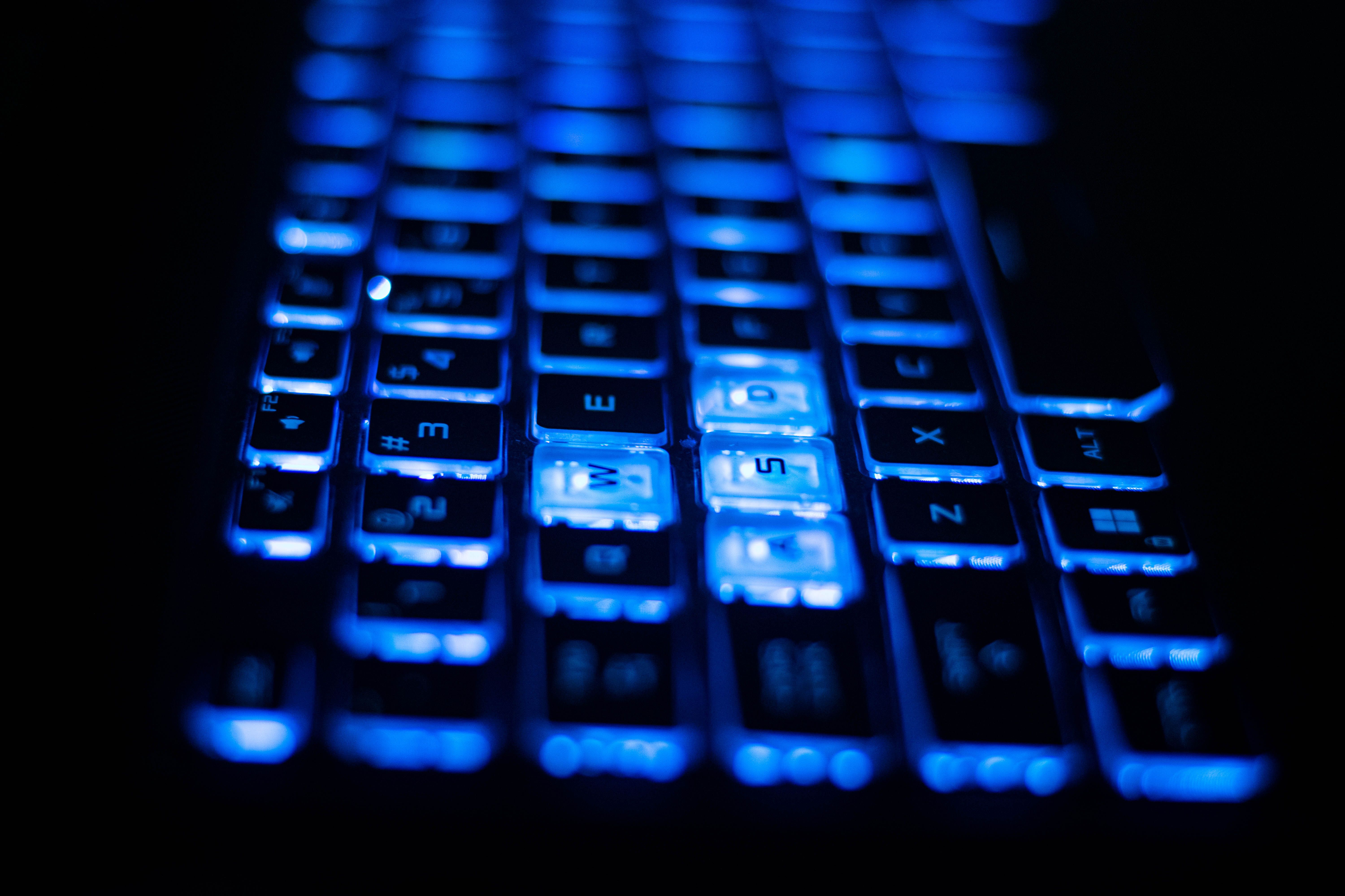 Illuminated Blue Backlit Keyboard Close-up