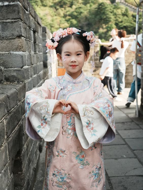 Young Girl in Traditional Chinese Dress on Great Wall Free Stock Photo Young Girl in Traditional Chinese Dress on Great Wall Free Stock Photo