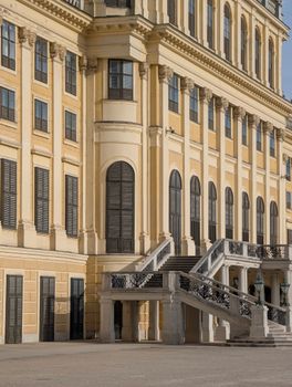Elegant baroque facade of Schönbrunn Palace in Vienna, Austria, showcasing intricate architectural details.