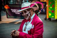 Man in Catrin costume at Día de Muertos parade, Mexico City.