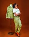 NYSC Member Posing with Uniform on Mannequin