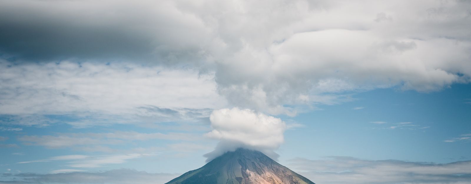 Majestic Volcano Concepcion with clouds over Lake Nicaragua. Perfect for travel and nature visuals.