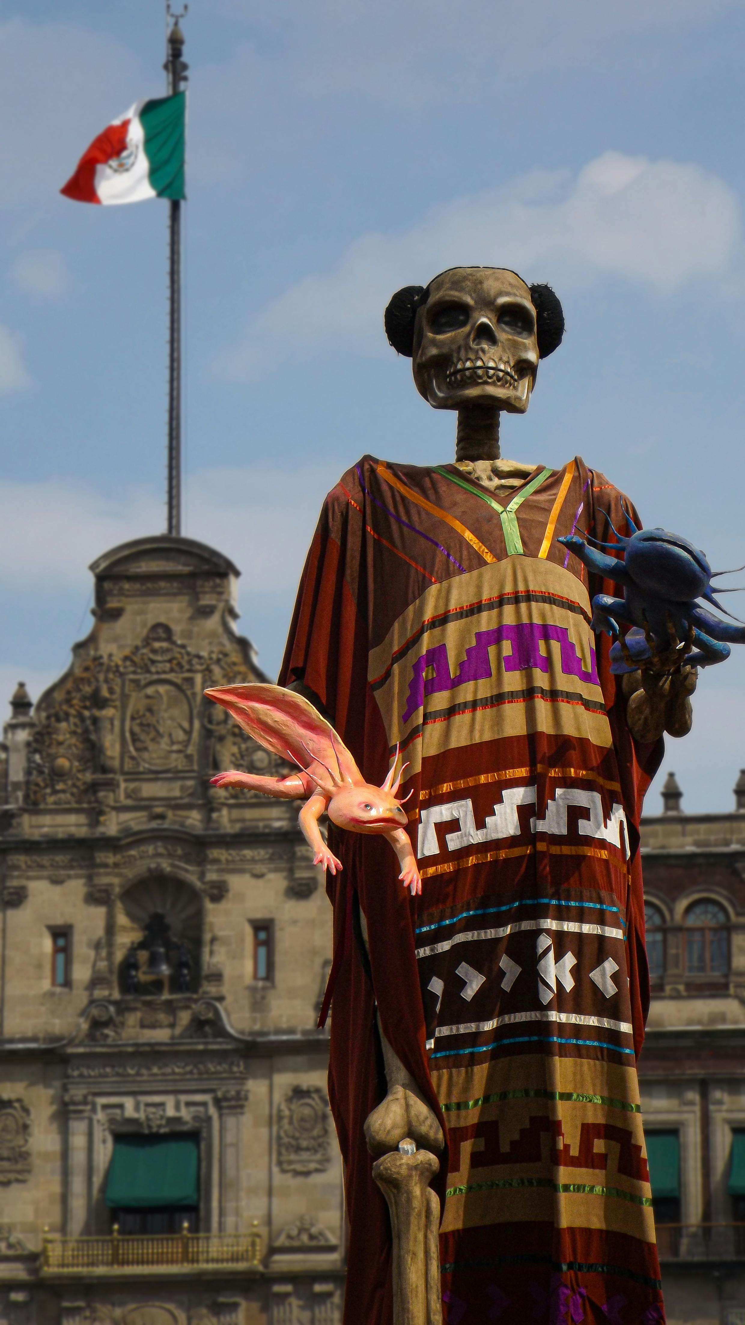 Decorative skeleton with axolotl during Dia de Muertos at Mexico City's Zócalo.