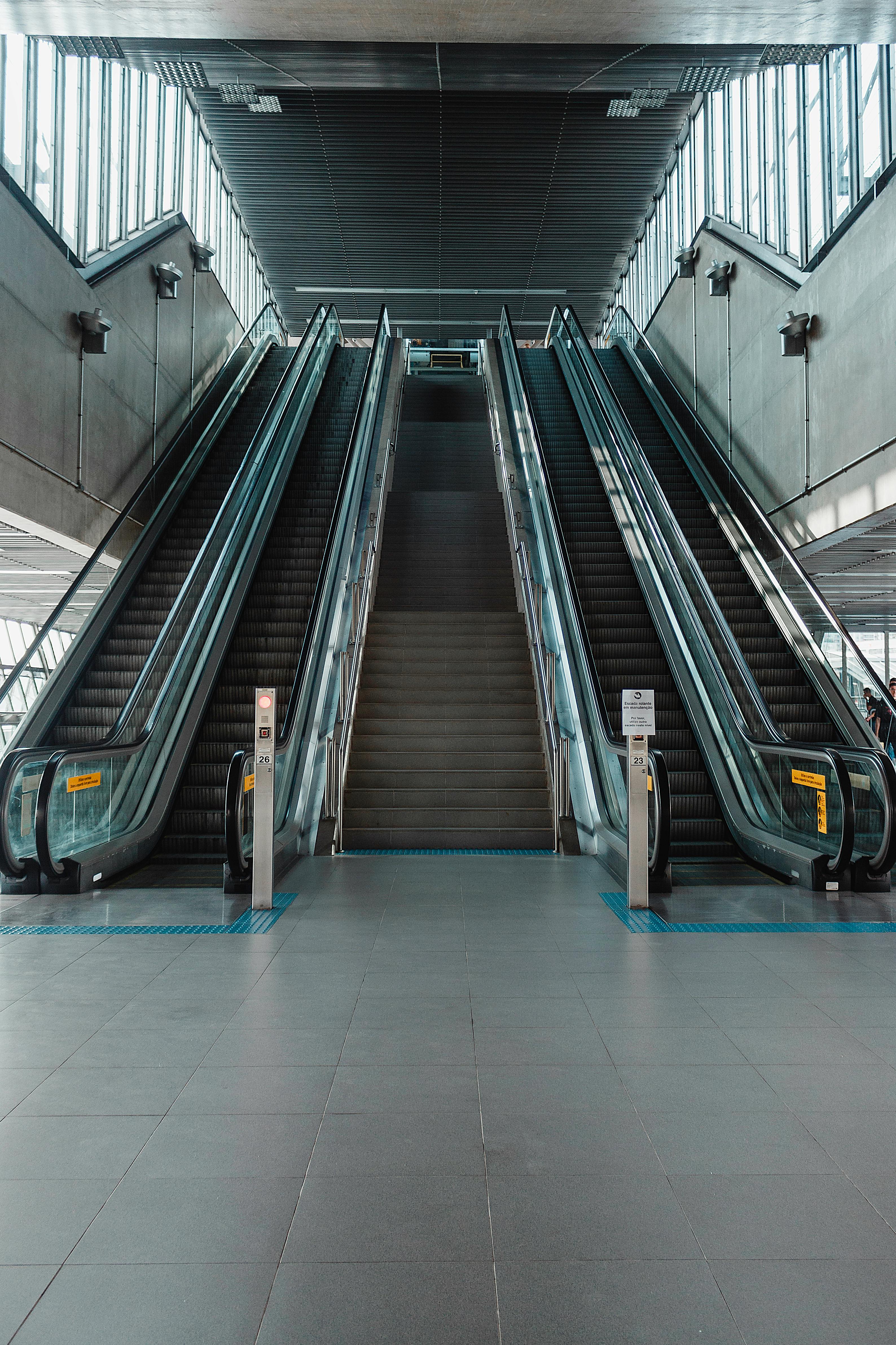 photo-of-stairs-between-escalators-free-stock-photo