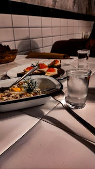 Charming presentation of Russian cuisine on a restaurant table with salmon roe appetizers.