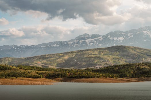 A breathtaking view of a mountain landscape with a peaceful lake, ideal for nature lovers and travel inspiration.
