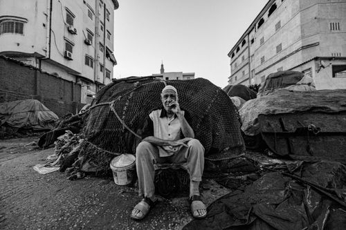 Free Black and white portrait of a fisherman in Ras El-Bar, showcasing a deep sense of tradition. Stock Photo