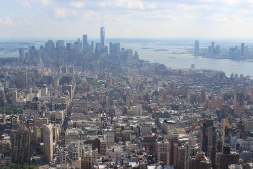 Free Stunning aerial view of New York City skyline with iconic skyscrapers on a clear day. Stock Photo