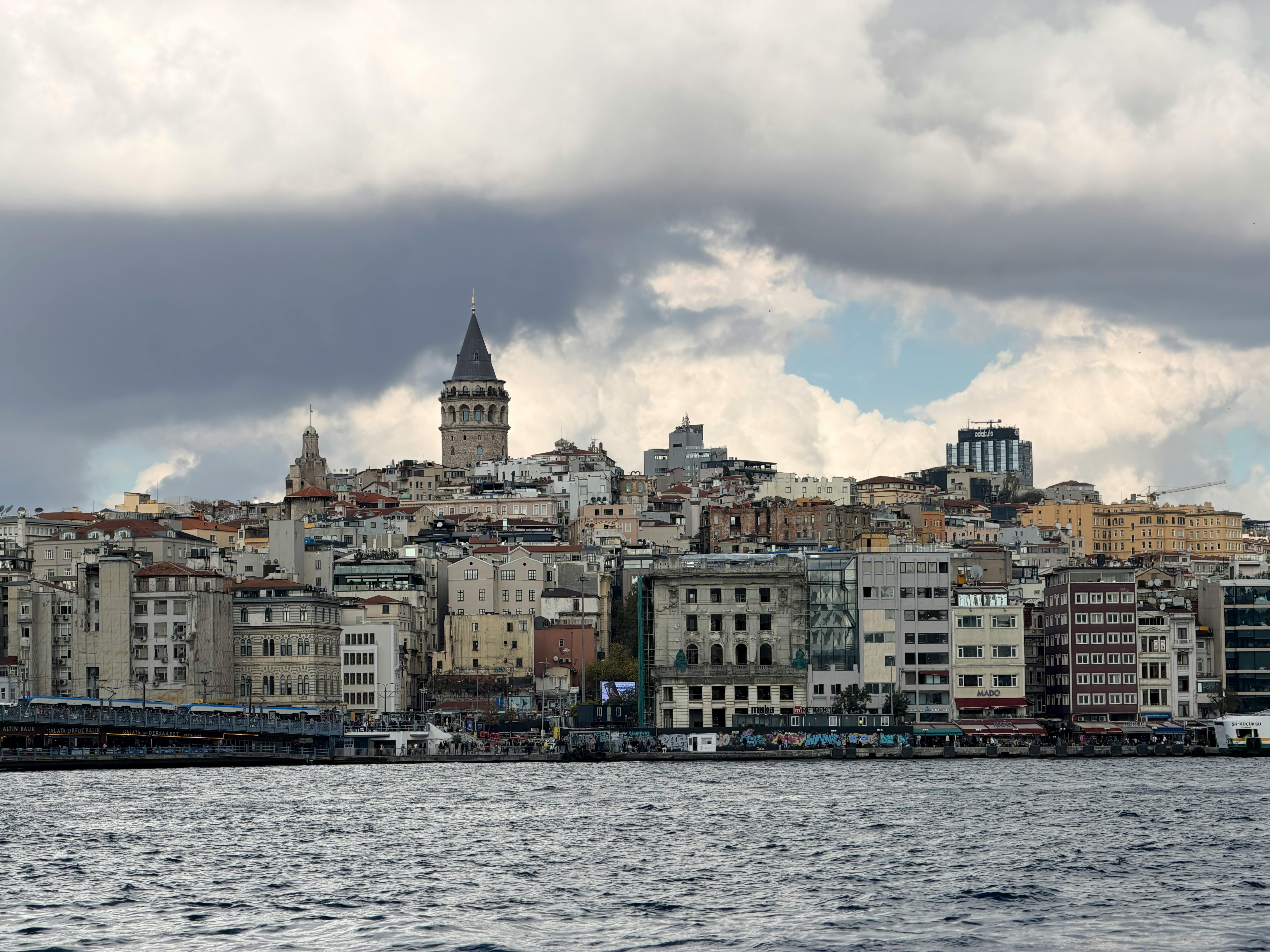 Galata Tower and Istanbul skyline viewed from the Bosphorus — 67m medieval tower built by Genoese in 1348