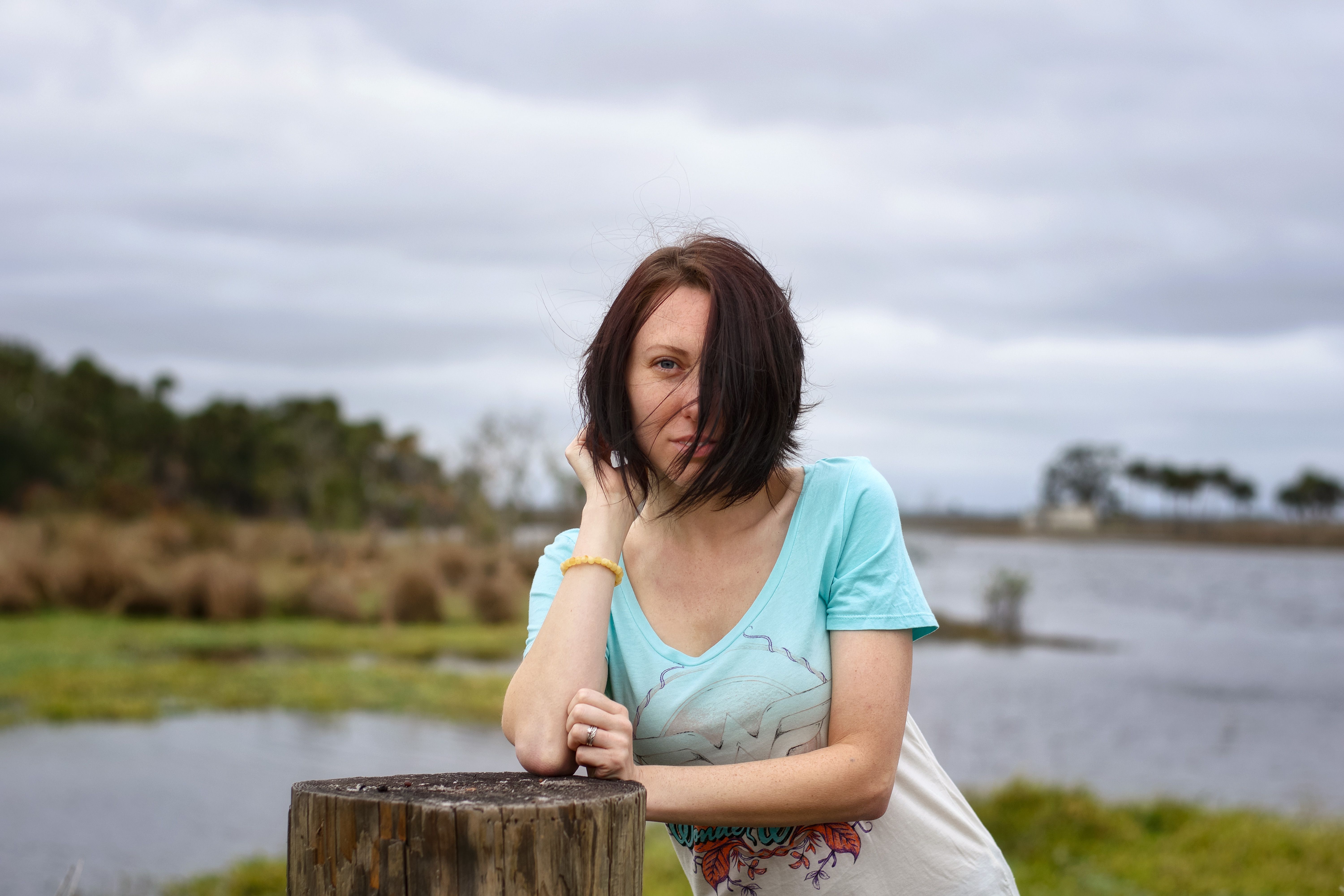 Young Woman Outdoors in Scenic Natural Setting · Free Stock Photo