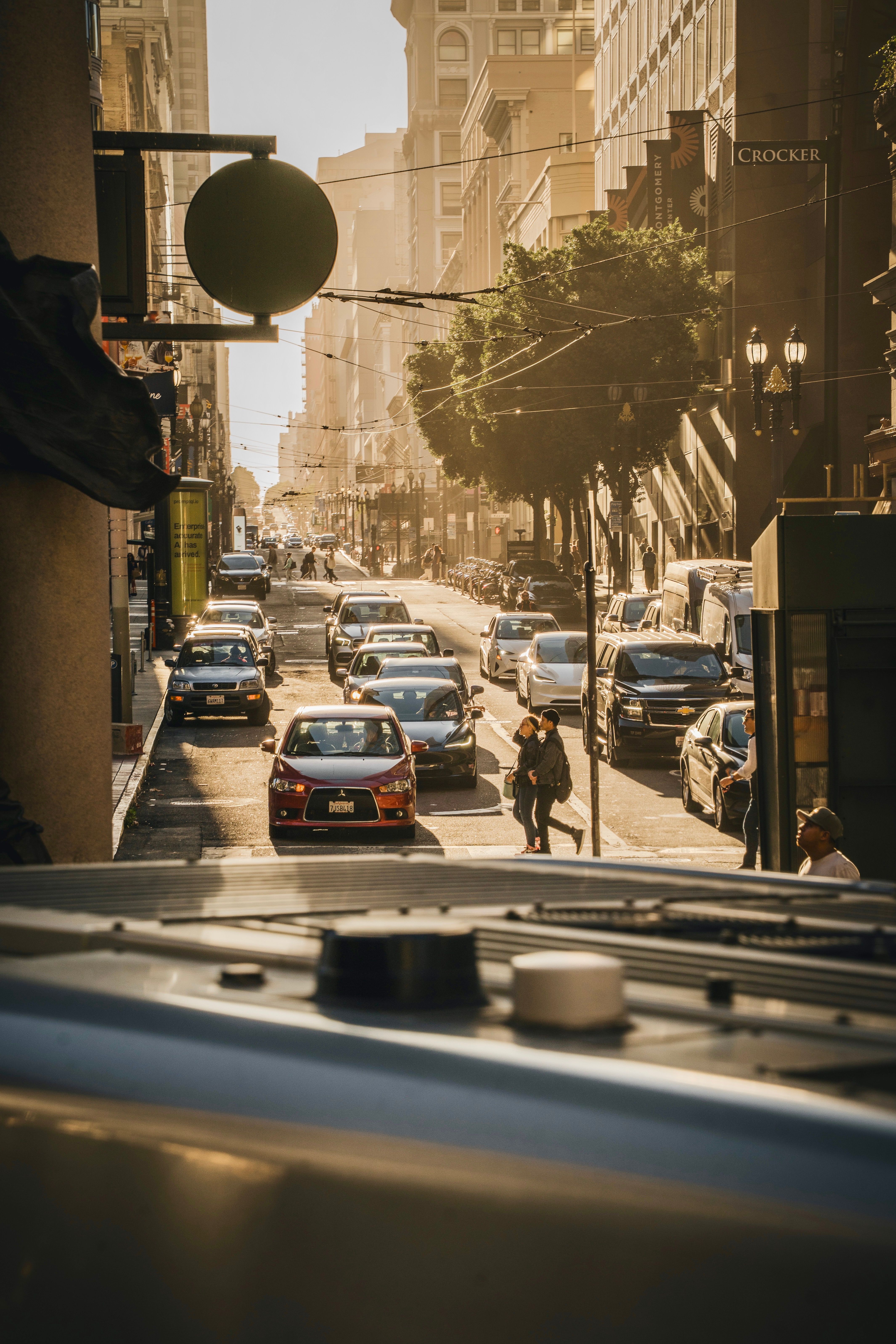 Busy Urban Street Scene in Golden Hour Lighting · Free Stock Photo