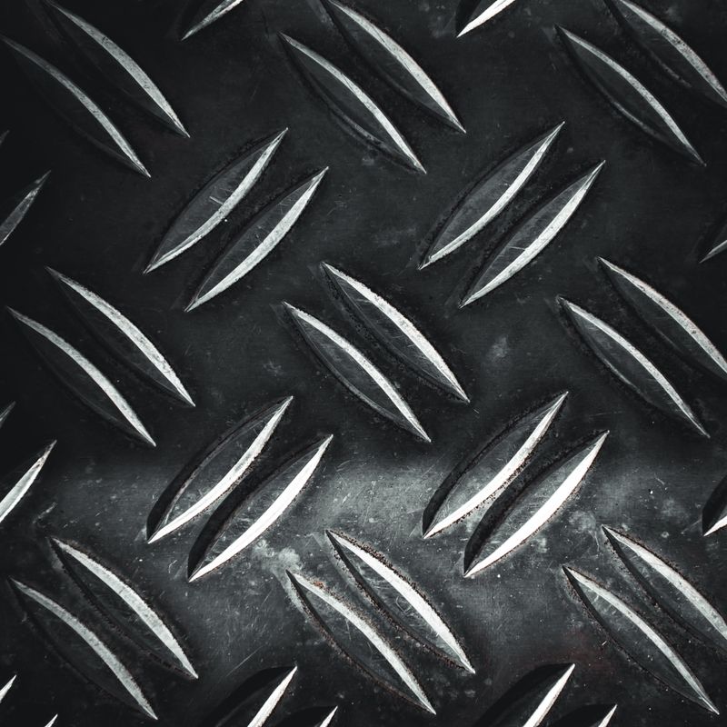 Diamond plate steel texture close-up