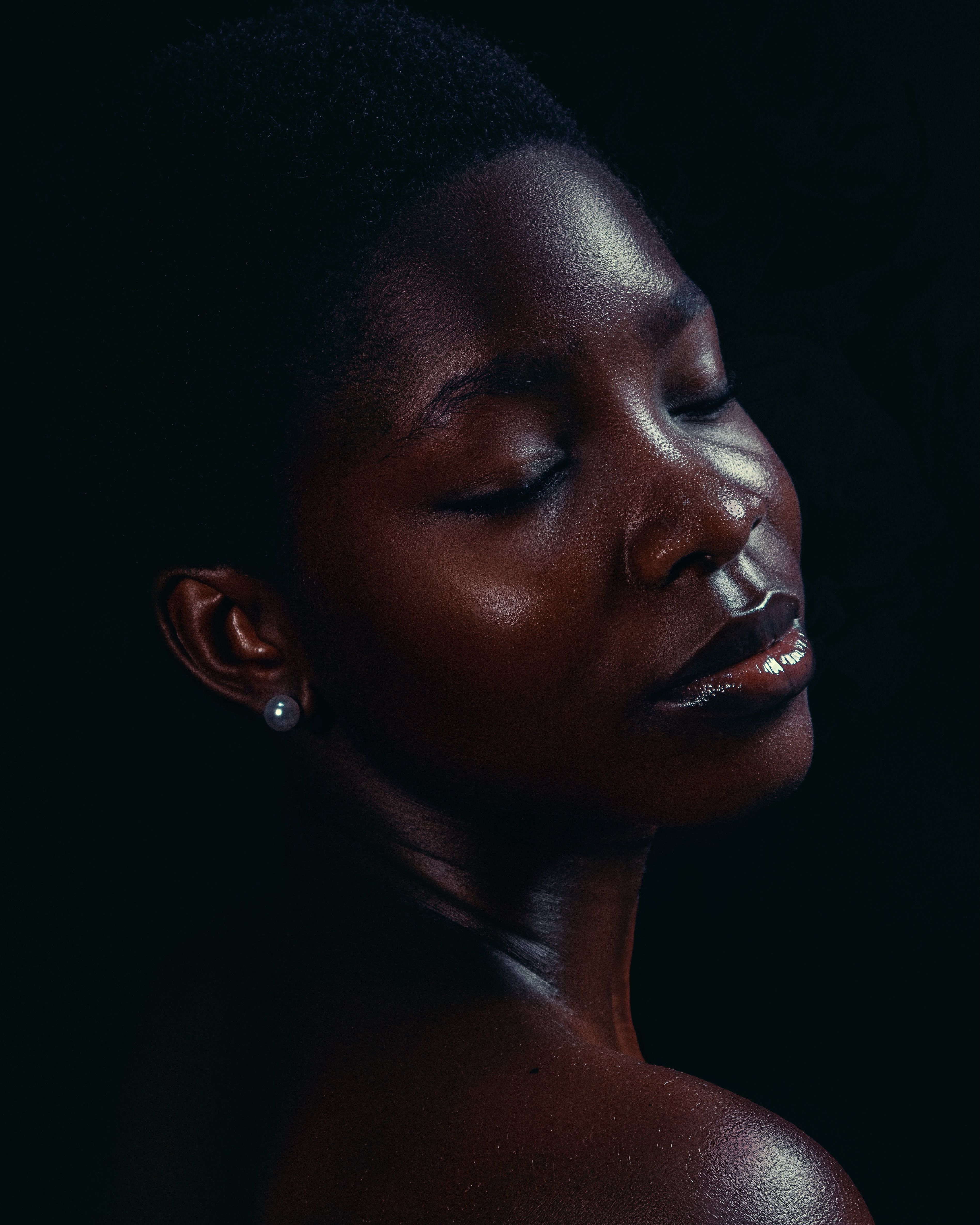 Elegant Portrait of Two African Women with Earrings · Free Stock Photo