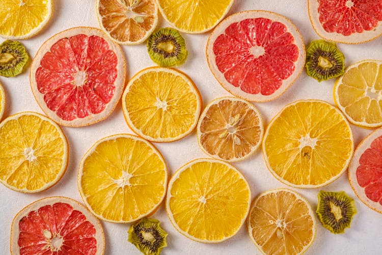 Sliced Oranges, Grapefruit And Kiwi Fruit