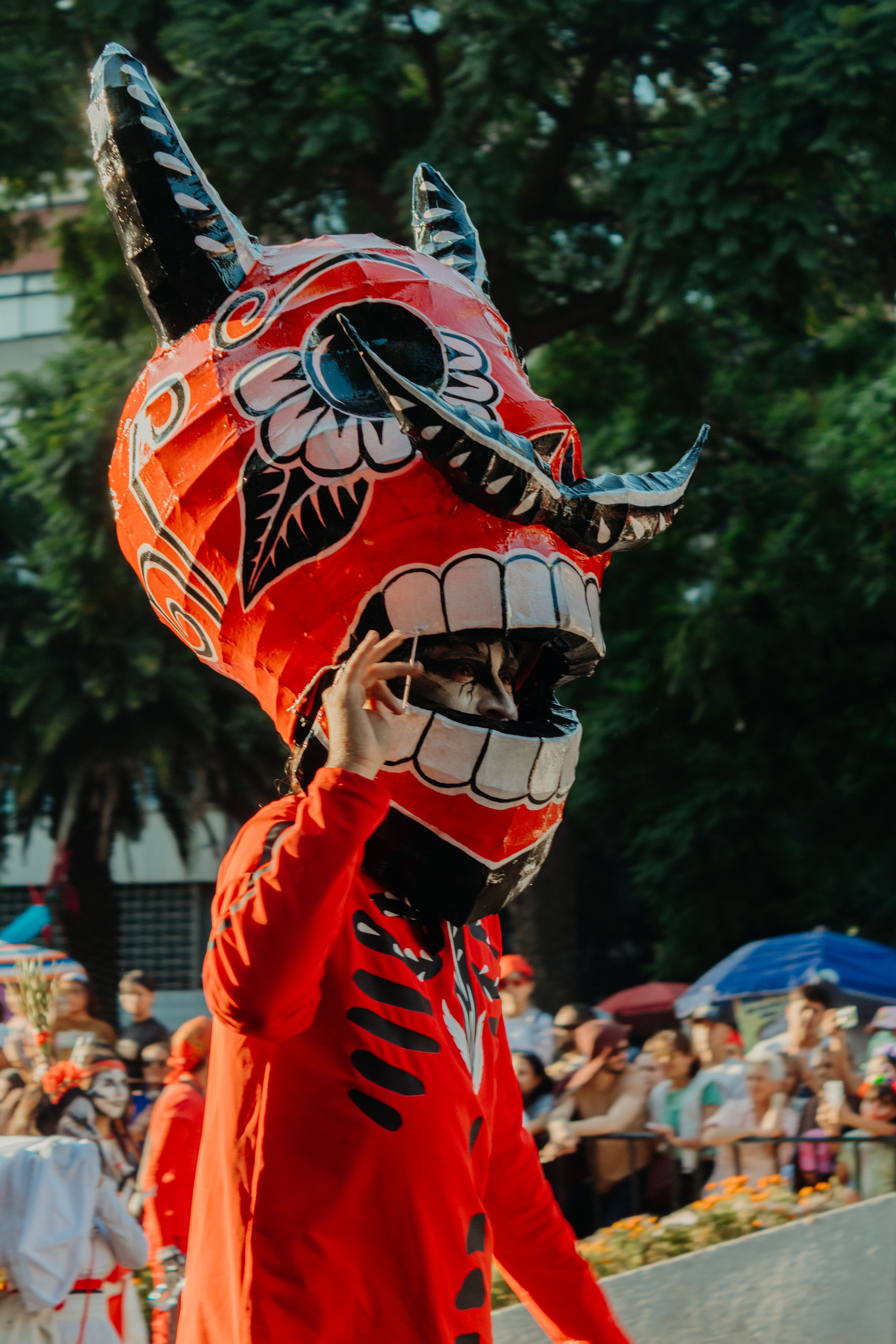 Colorful Festival Parade with Giant Mask · Free Stock Photo
