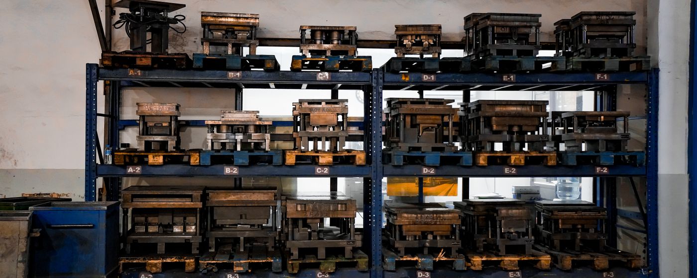 Warehouse shelving with metal molds organized