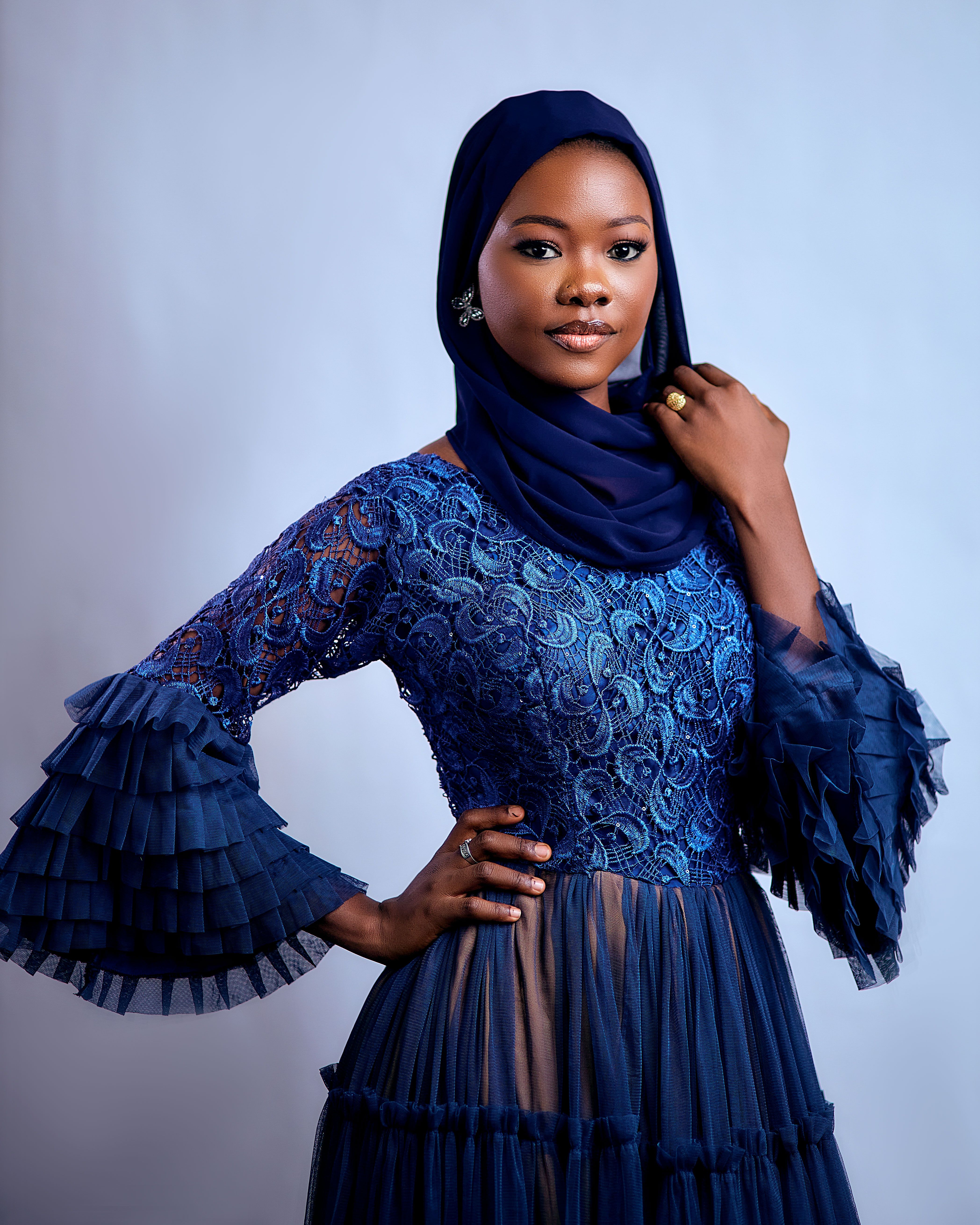 Elegant Woman in Blue Lace Dress and Hijab Portrait · Free Stock Photo