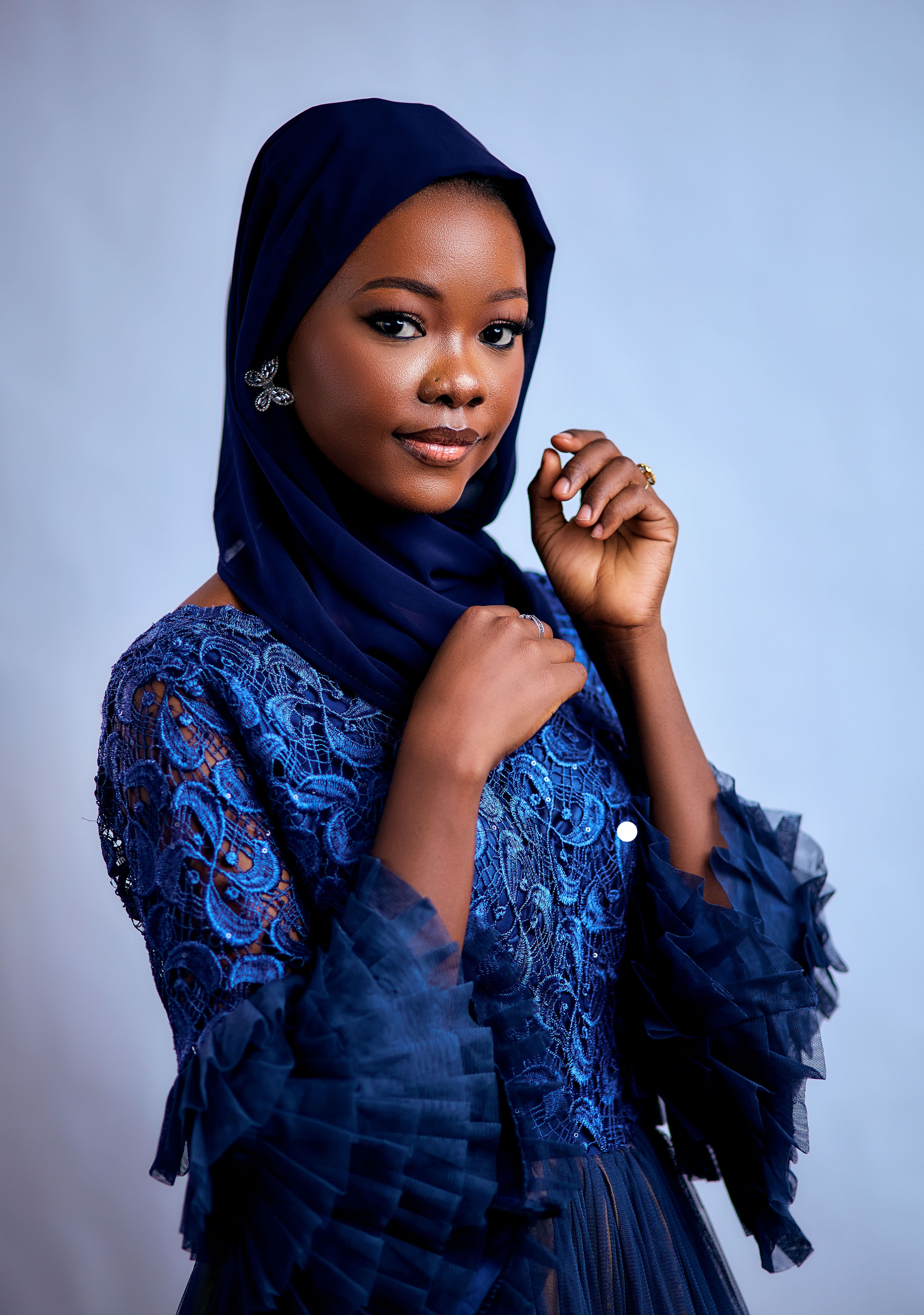 Elegant Woman in Blue Hijab Portrait Shot · Free Stock Photo
