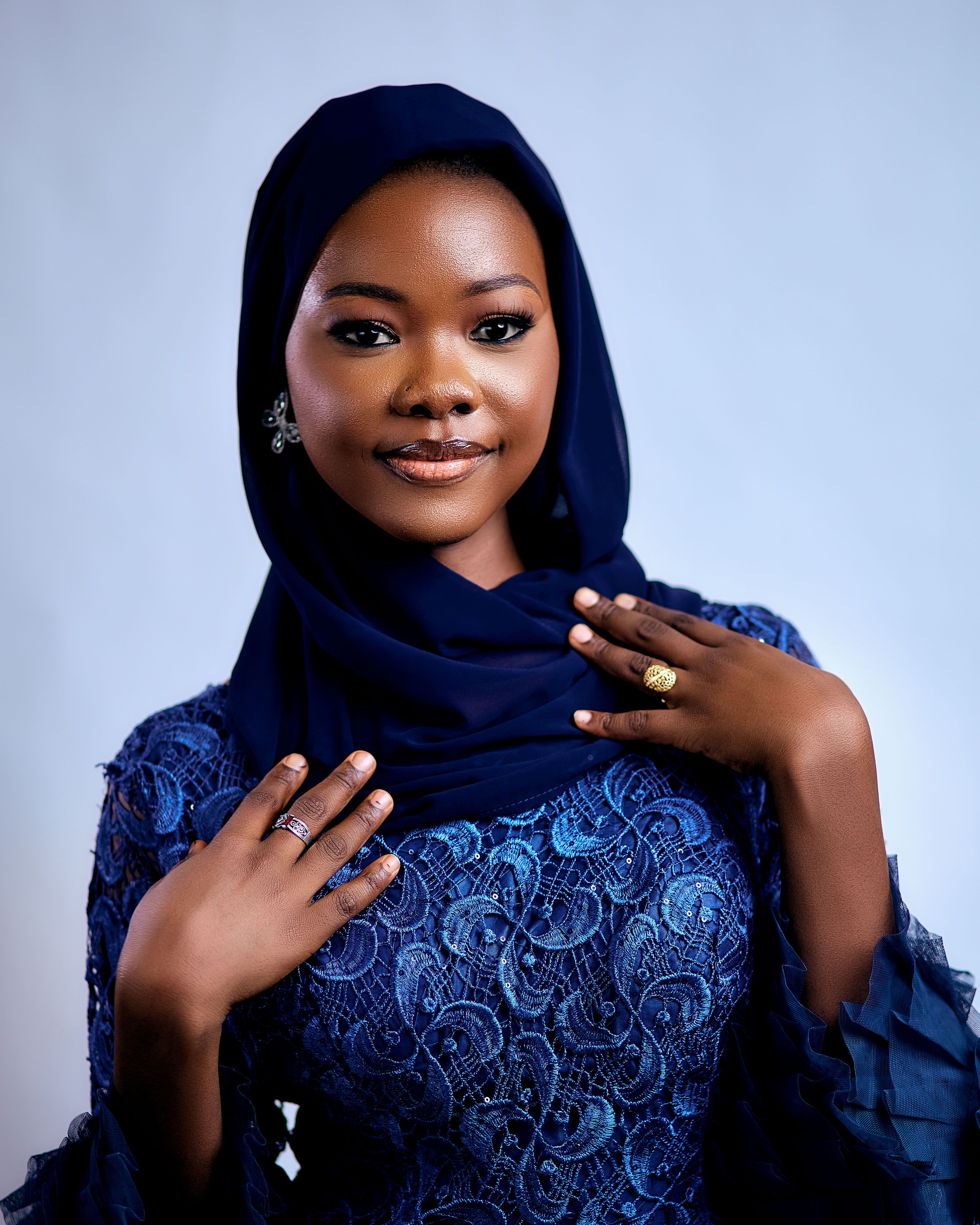 Elegant Portrait of Woman in Blue Hijab · Free Stock Photo