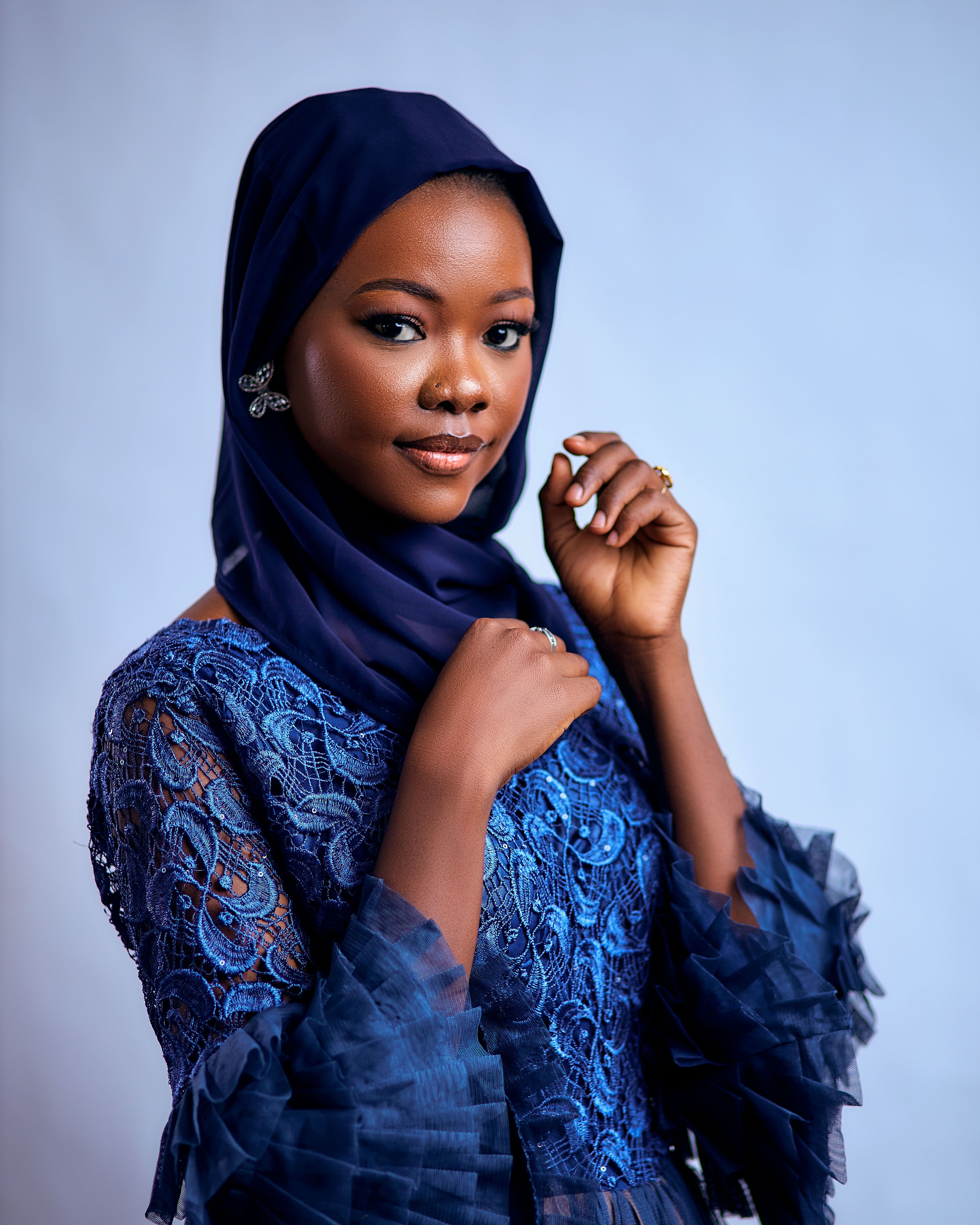 Elegant Portrait of Woman in Blue Hijab · Free Stock Photo