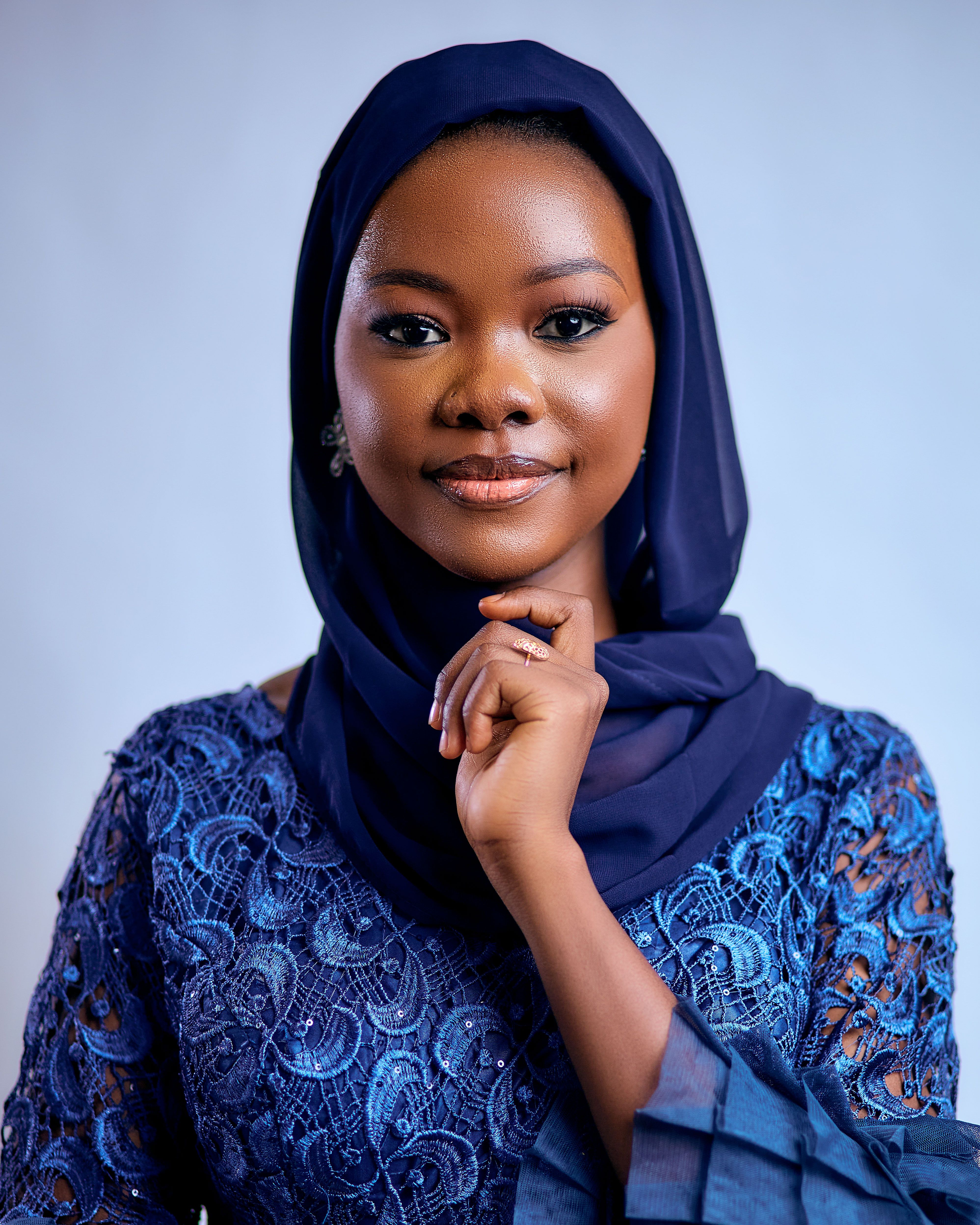 Elegant Portrait of Woman in Blue Hijab · Free Stock Photo