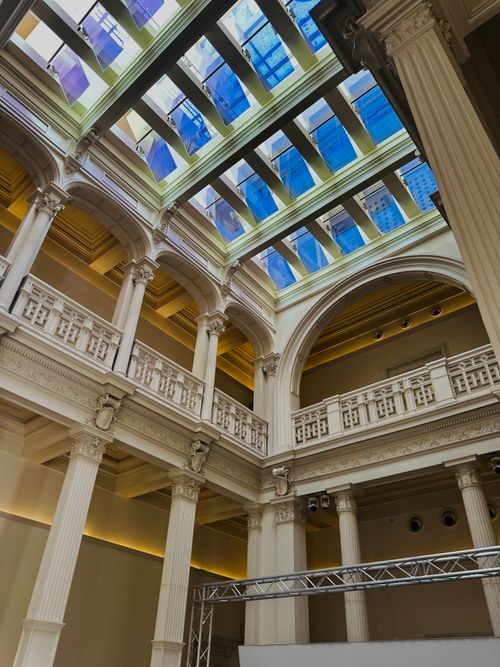 Free Elegant interior of Salt Galata in İstanbul showcasing classical architecture with ornate columns and glass ceiling. Stock Photo