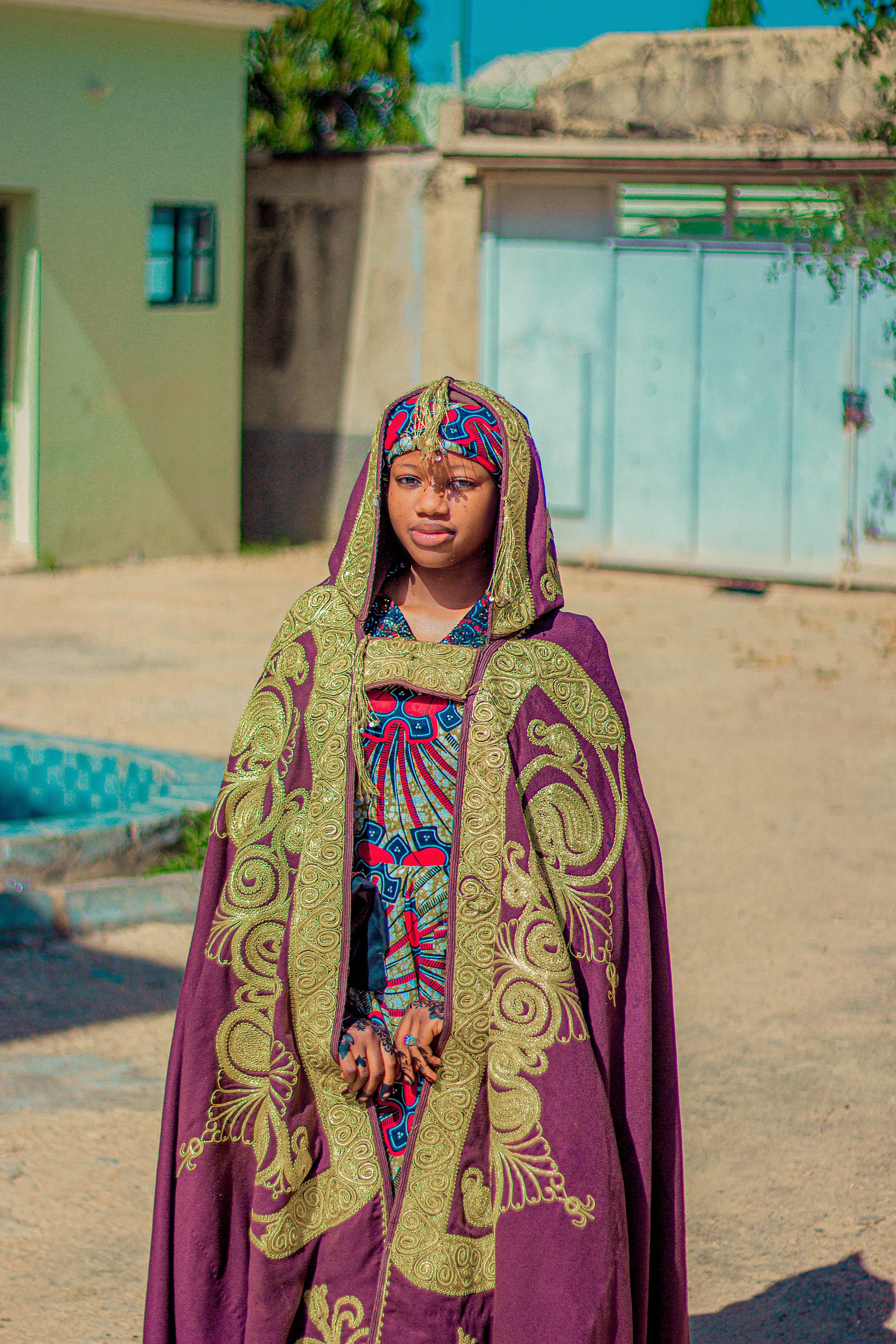 Colorful Traditional African Attire Portrait Outdoors · Free Stock Photo